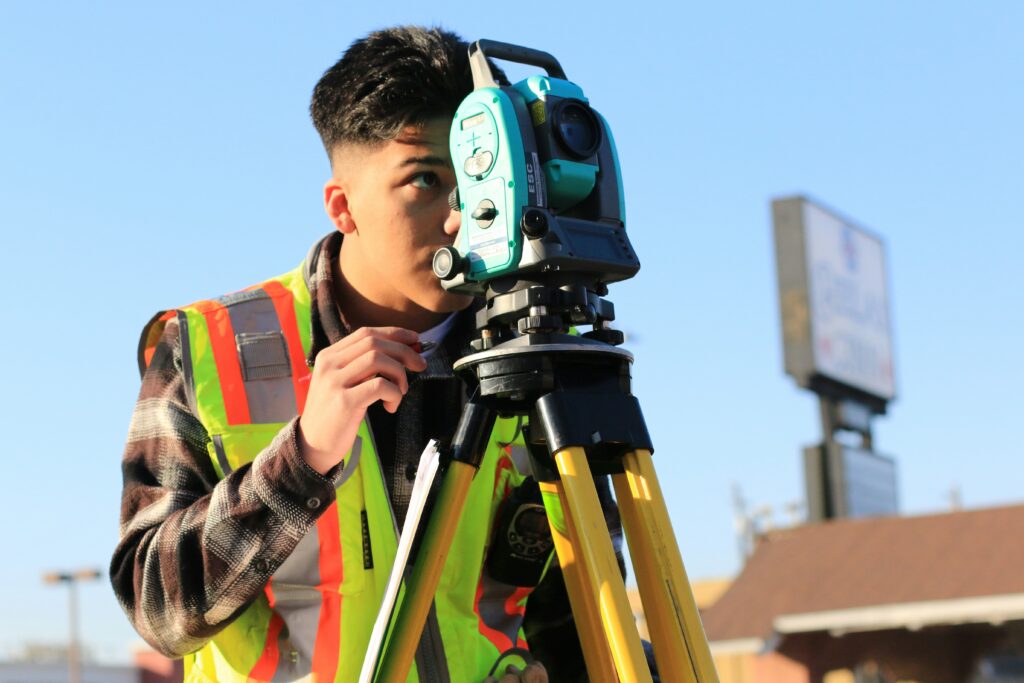 Young man surveying
